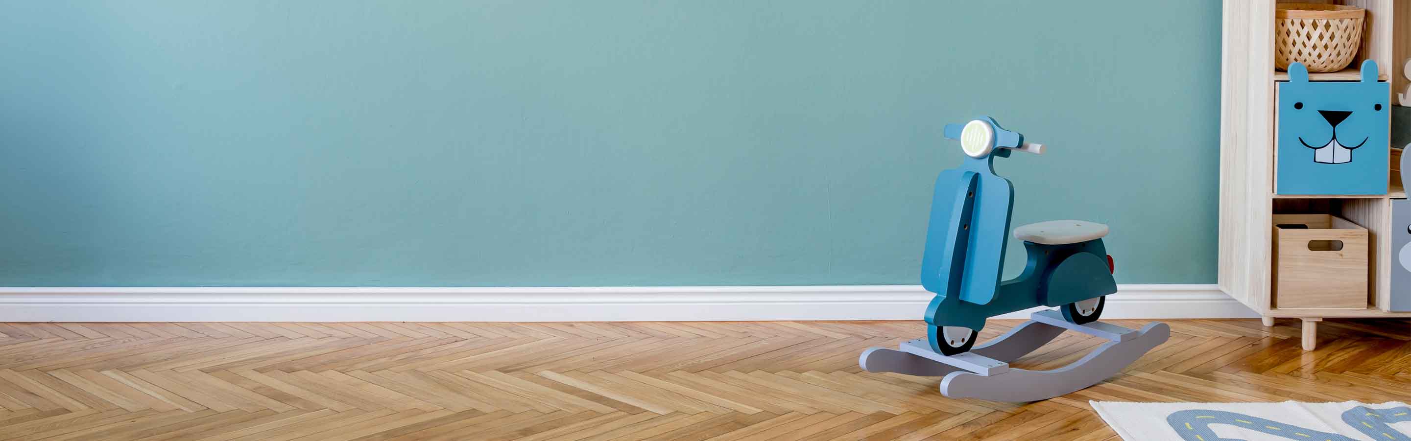 playroom with blue teal wall